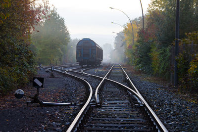 Scenic view of railway carriage on railroad track