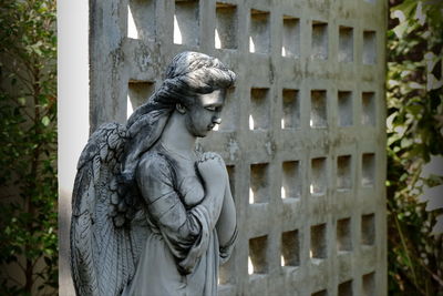 Statue of angel in cemetery