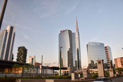 Low angle view of buildings in city against sky