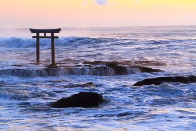 Scenic view of sea against sky during sunset