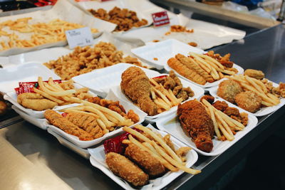 Variety of fast food on table