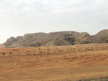 Scenic view of desert against sky