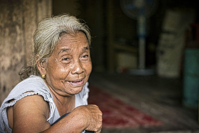 A close-up of single indigenous woman smiling