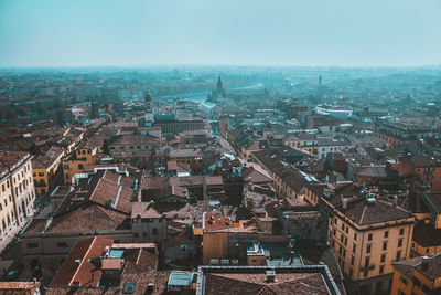 Sunny day in verona city centre, italy. panoramic view from above on old town streets and landmarks