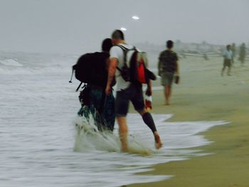 People enjoying at beach