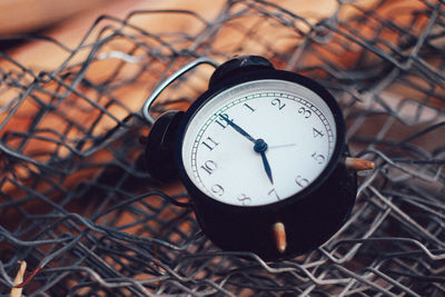 High angle view of clock on field