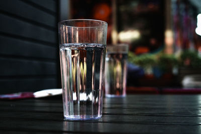 Close-up of beer glass on table