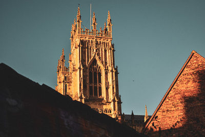 Low angle view of cathedral against clear blue sky