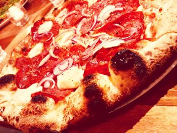 Close-up of pizza served in plate