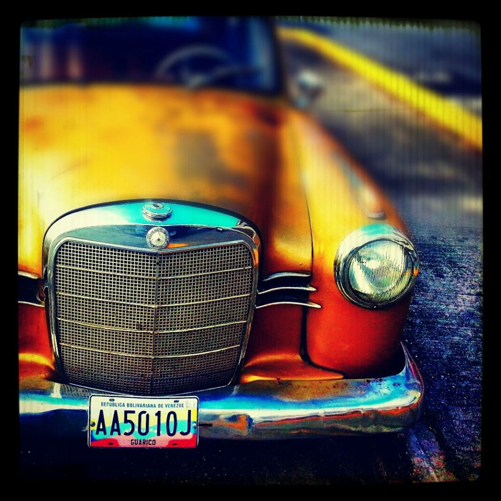 transfer print, auto post production filter, indoors, close-up, no people, still life, yellow, transportation, focus on foreground, absence, selective focus, multi colored, blue, seat, in a row, metal, illuminated, mode of transport, day