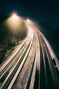 Railroad tracks at night