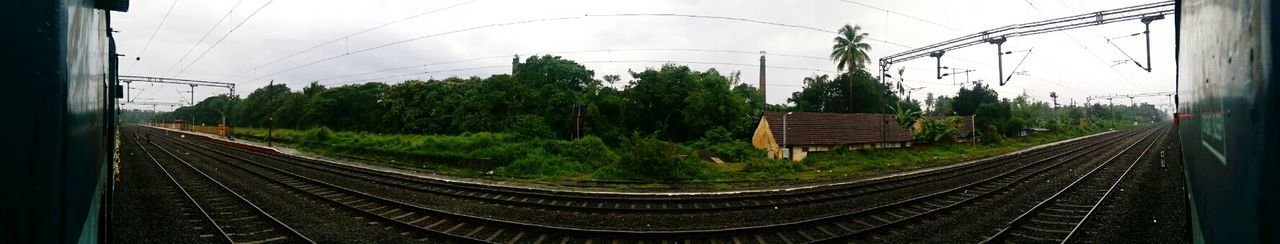 Railroad track seen through train windshield