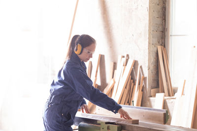 Man working on wood