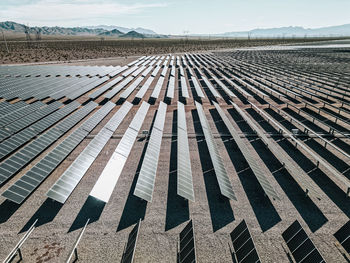 Renewable solar energy solar farm in the desert of southern nevada on a dry lake bed.