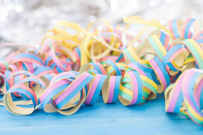 Close-up of multi colored candies on table