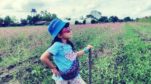 Girl standing on field