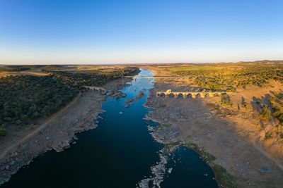 High angle view of land against clear sky