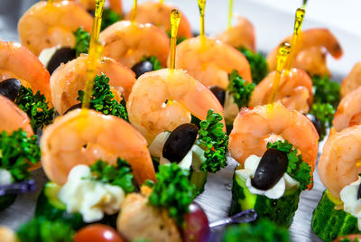 Close-up of seafood canapes on table