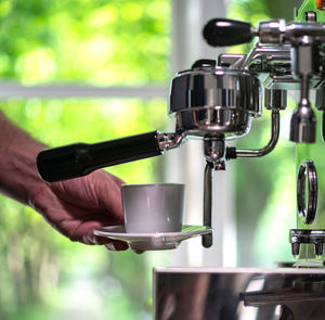 Man holding coffee cup