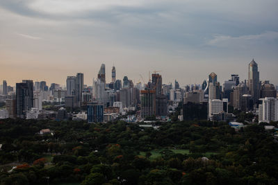 Modern buildings in city against sky