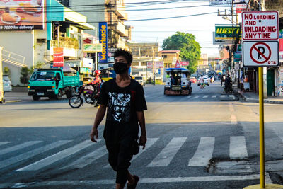 Full length of man on city street