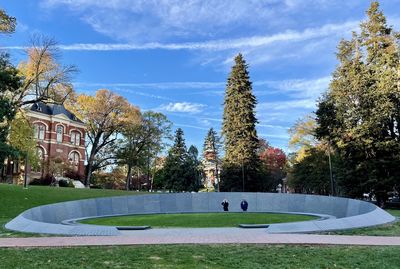 Park by building against sky