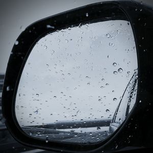 Close-up of raindrops on glass window