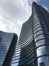 Low angle view of modern buildings against sky