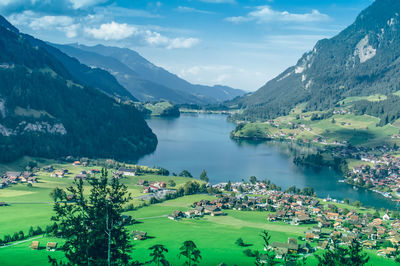 Scenic view of mountains and lake against sky