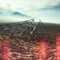 Scenic view of landscape against cloudy sky