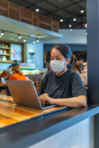 Woman using laptop