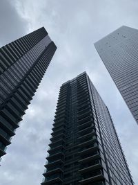 Low angle view of skyscraper against sky