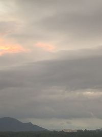 Scenic view of mountains against sky during sunset