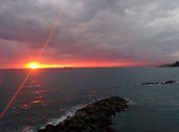Scenic view of sea against sky during sunset