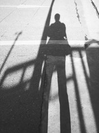 Shadow of man standing on floor