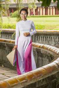 Beautiful woman exploring the imperial palace in hue / vietnam