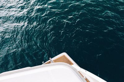 Cropped image of boat sailing on sea