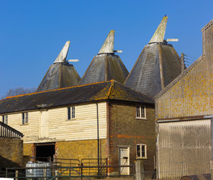 Low angle view of old building against clear sky