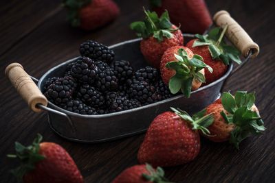 Close-up of fruits in bowl on table