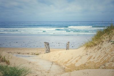 Scenic view of beach against sky