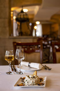 Wine glasses on table in restaurant