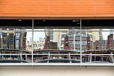 View of building seen through metal grate