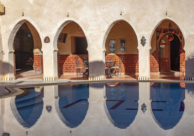 Reflection of buildings on glass window