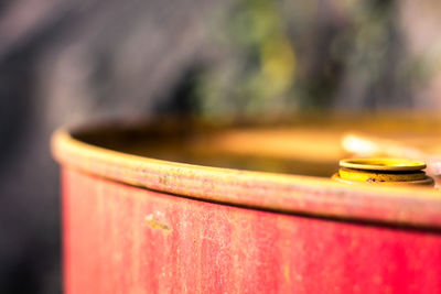 Close-up of rusty oil drum