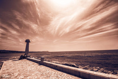 Scenic view of sea at sunset