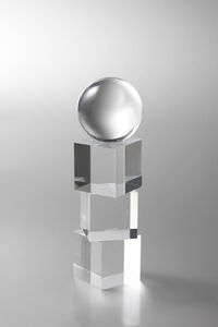 Close-up of toy on table against white background