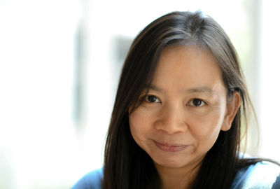 Close-up portrait of smiling woman