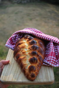 Close-up of hand holding ice cream