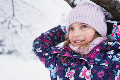 Smiling girl in snow