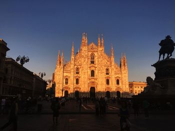 Exterior of cathedral against clear sky during sunset